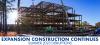 An image of the new building construction with the text "Expansion Construction Continues; Summer 2023 Disruptions"