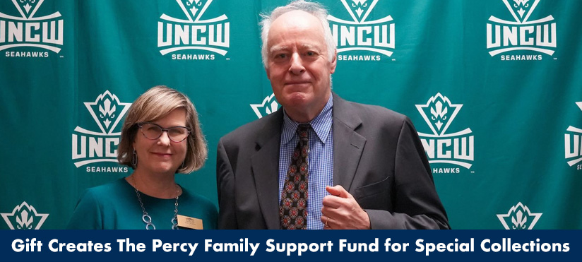 Dean of the Library Lucy Holman standing next to Dr. Antony Percy